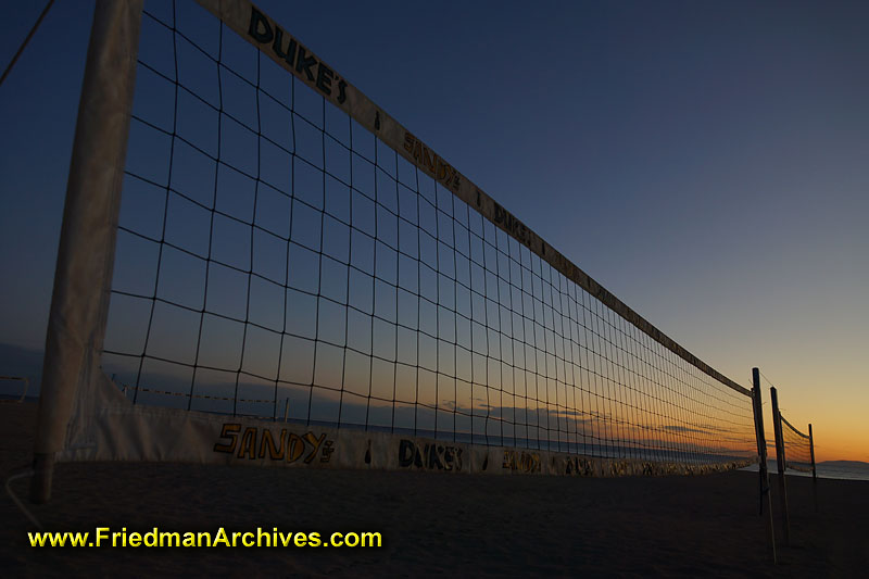 beach,nets,sunset,twilight,dusk,dawn,empty,scenic,blue,sky,volleyball,sports,dormant,